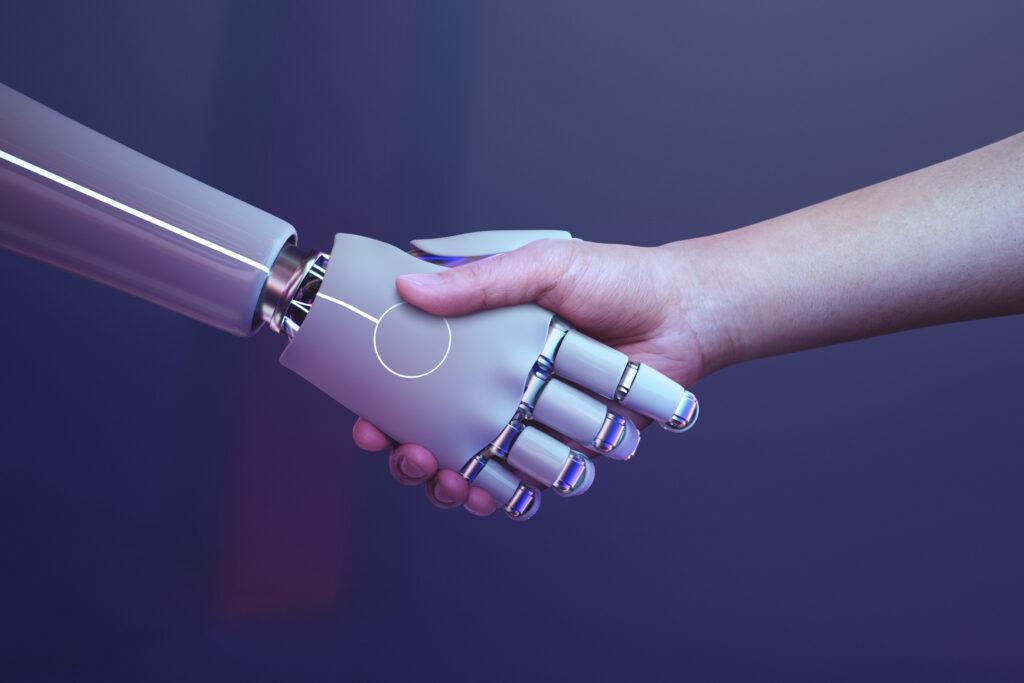 Apretón de manos entre un robot y un humano
